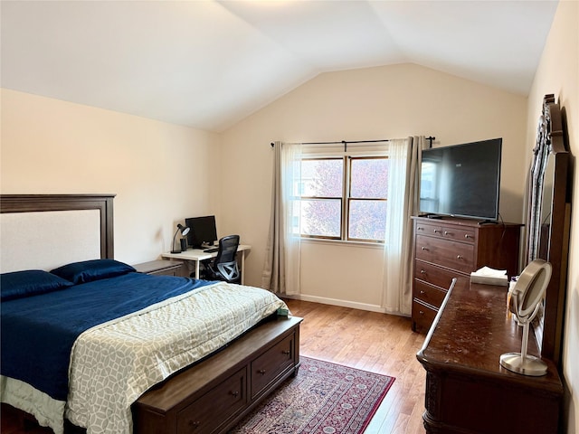 467 Scranton Ave, Lynbrook, NY 11563 - bedroom featuring light wood-type flooring, vaulted ceiling, and an office area