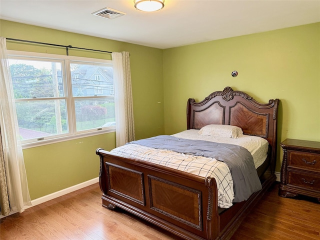 467 Scranton Ave, Lynbrook, NY 11563 - bedroom featuring wood finished floors and baseboards