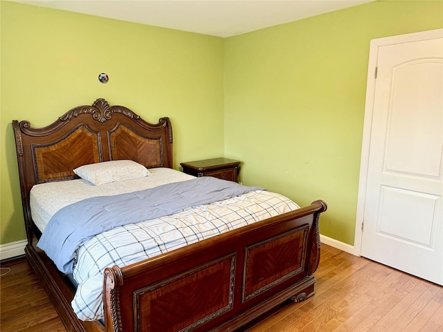467 Scranton Ave, Lynbrook, NY 11563 - bedroom featuring wood finished floors and baseboards