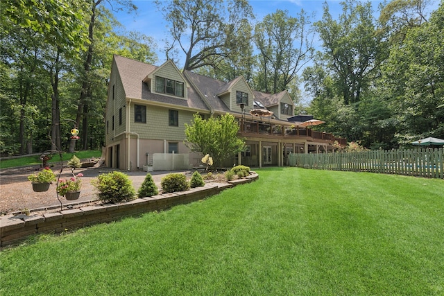 23 Bacon Rd, Head Of The Harbor, NY 11780 - rear view of property with a garage, a deck, roof with shingles, and driveway