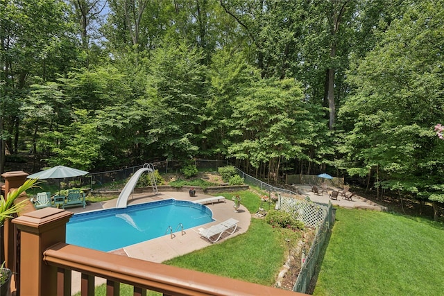 23 Bacon Rd, Head Of The Harbor, NY 11780 - view of pool featuring a water slide, a fenced backyard, a patio area, and a diving board