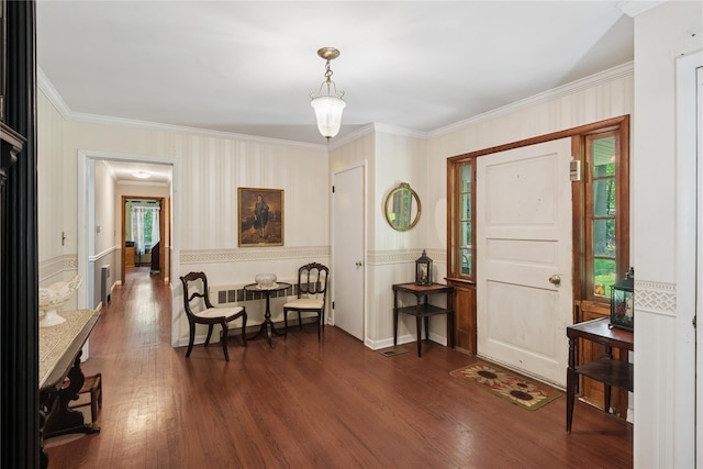 23 Bacon Rd, Head Of The Harbor, NY 11780 - entrance foyer with ornamental molding, dark wood-style flooring, a wainscoted wall, and wallpapered walls