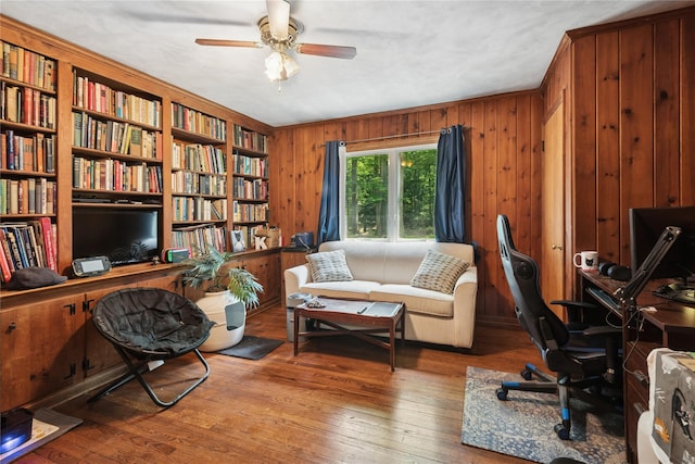23 Bacon Rd, Head Of The Harbor, NY 11780 - office space with ceiling fan, wood-type flooring, and wood walls