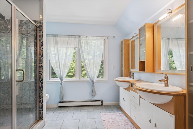 23 Bacon Rd, Head Of The Harbor, NY 11780 - bathroom featuring a baseboard radiator, double vanity, lofted ceiling, tile patterned flooring, and a shower stall