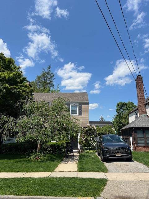 227 Elm St, West Hempstead, NY 11552 - view of front of house with driveway