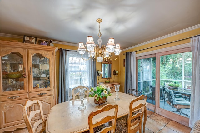 227 Elm St, West Hempstead, NY 11552 - dining room with a chandelier, light tile patterned flooring, and ornamental molding