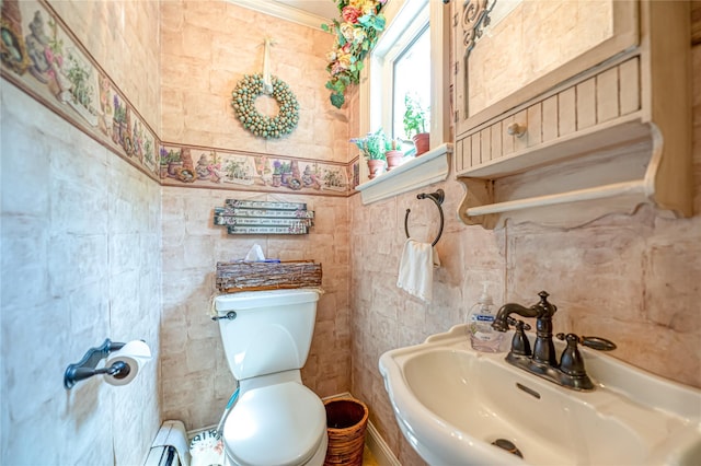 227 Elm St, West Hempstead, NY 11552 - bathroom with tile walls and baseboard heating