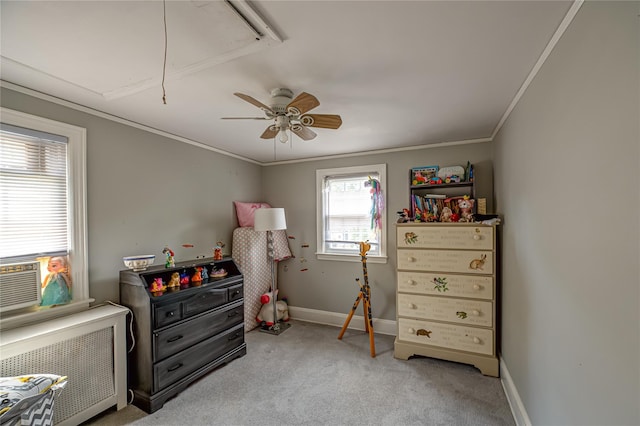 227 Elm St, West Hempstead, NY 11552 - bedroom with attic access, radiator, light colored carpet, ceiling fan, and crown molding
