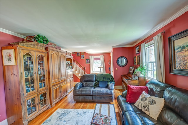 227 Elm St, West Hempstead, NY 11552 - living room with stairs, light wood finished floors, and ornamental molding