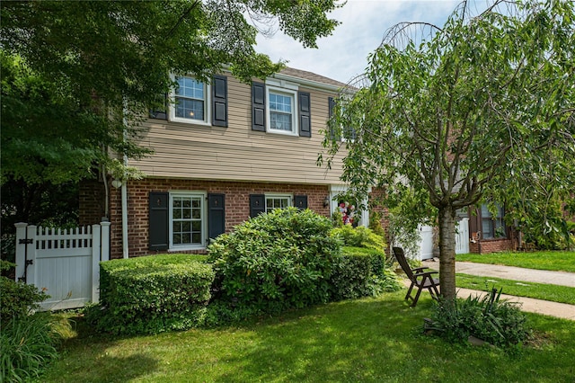 227 Elm St, West Hempstead, NY 11552 - view of front of house featuring brick siding