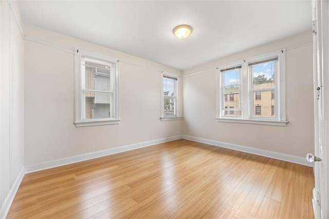 610 Van Cortlandt Park Ave, Yonkers, NY 10705 - empty room featuring baseboards and light wood finished floors