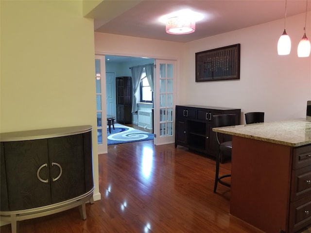 102-25 67th Rd Unit 5D, Forest Hills, NY 11375 - dining area with dark wood-style floors and radiator heating unit