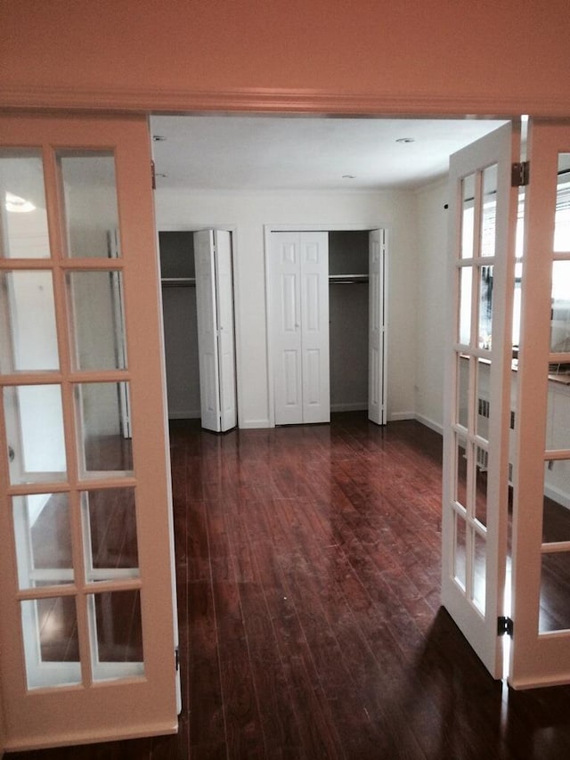 102-25 67th Rd Unit 5D, Forest Hills, NY 11375 - corridor with dark wood-type flooring and french doors