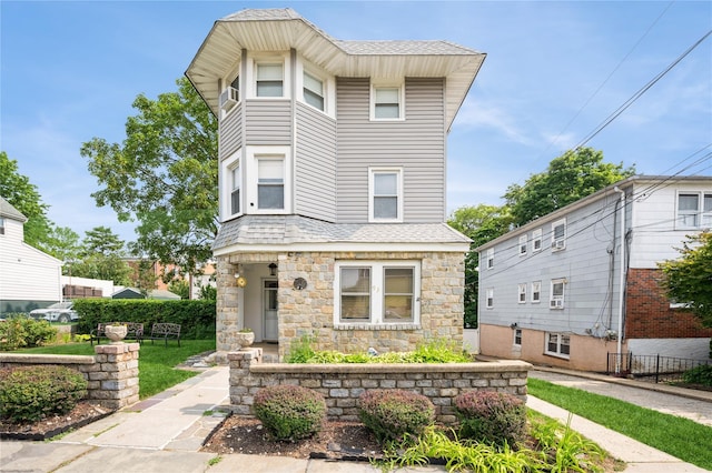 93 Edgewood Ave, Yonkers, NY 10704 - view of front of house featuring stone siding and roof with shingles