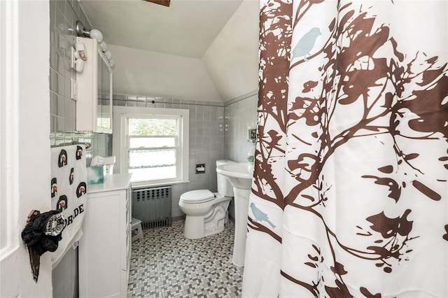 93 Edgewood Ave, Yonkers, NY 10704 - bathroom with radiator, tile walls, tile patterned floors, and a shower with shower curtain
