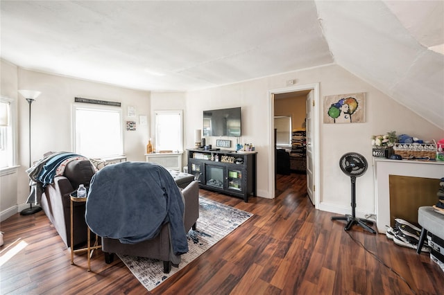 93 Edgewood Ave, Yonkers, NY 10704 - living area featuring dark wood-style flooring and lofted ceiling