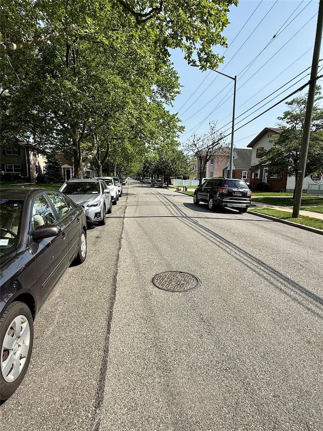 82-09 268th St Apt B, New Hyde Park, NY 11040 - view of asphalt road with sidewalks