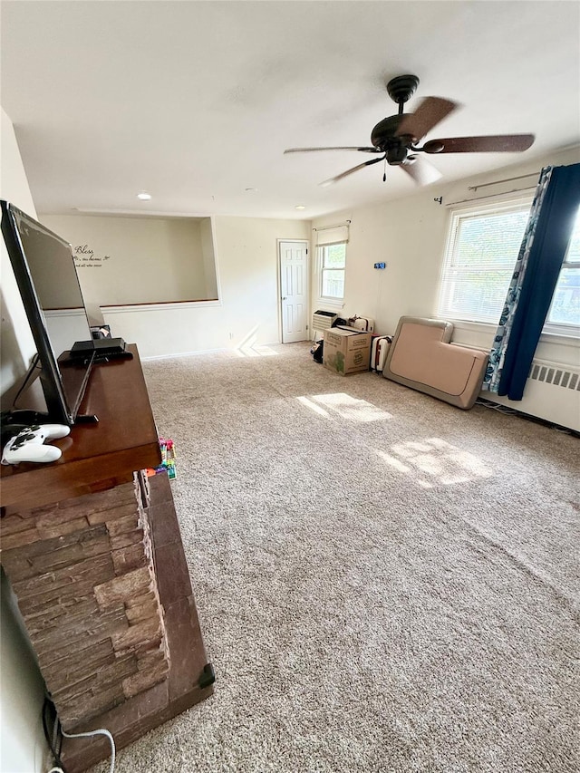 82-09 268th St Apt B, New Hyde Park, NY 11040 - living room featuring carpet and a ceiling fan