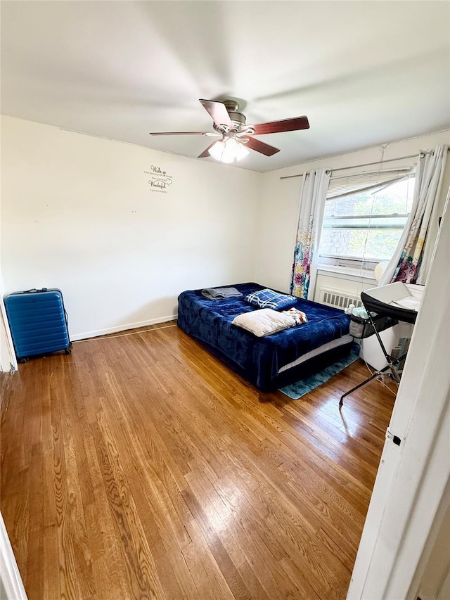 82-09 268th St Apt B, New Hyde Park, NY 11040 - bedroom featuring wood finished floors and a ceiling fan