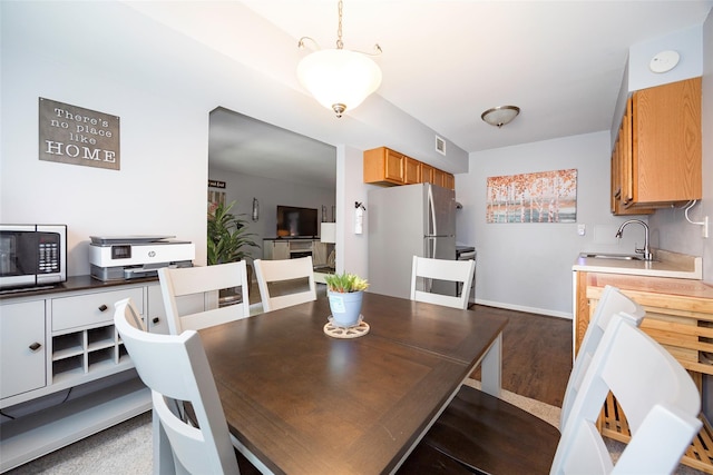 26Cooper Road 307, Poughkeepsie, NY 12603 - dining space featuring baseboards and wood finished floors