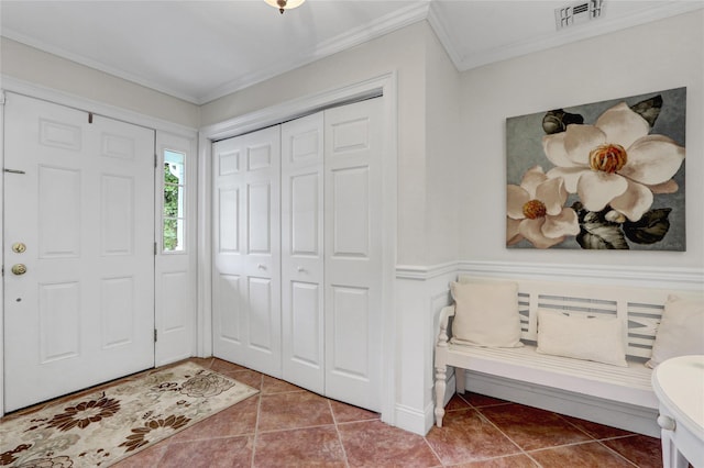 1 Willis Ave, Port Jefferson, NY 11777 - tiled foyer entrance featuring crown molding