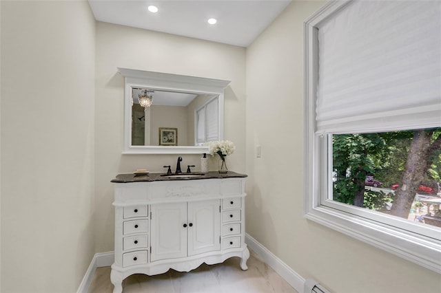 1 Willis Ave, Port Jefferson, NY 11777 - bathroom featuring vanity, marble finish flooring, a baseboard heating unit, and recessed lighting