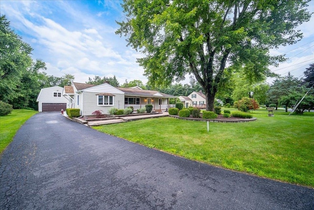 64 Mountainview Rd, Fishkill, NY 12524 - single story home featuring a front lawn and asphalt driveway