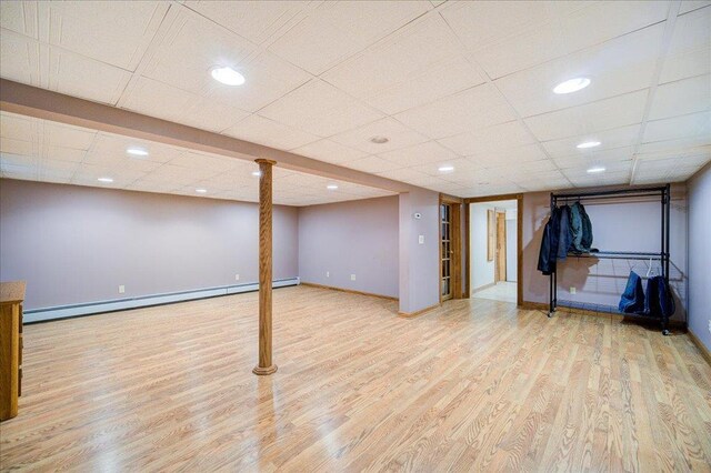 64 Mountainview Rd, Fishkill, NY 12524 - finished basement with a baseboard radiator, wood finished floors, and recessed lighting