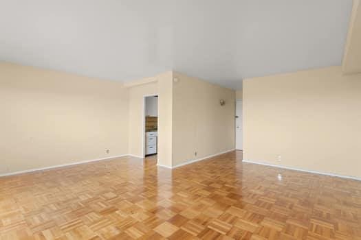 4 Fordham Hill Oval Unit 12B, Bronx, NY 10468 - unfurnished room featuring baseboards