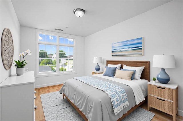55 1st St Unit 207, Pelham, NY 10803 - bedroom featuring wood finished floors and baseboards