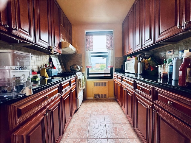 63-84 Saunders St Unit 2G, Rego Park, NY 11374 - kitchen featuring range hood, radiator heating unit, white appliances, and tasteful backsplash