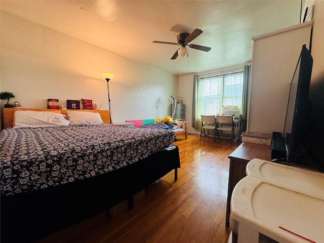 63-84 Saunders St Unit 2G, Rego Park, NY 11374 - bedroom with hardwood / wood-style flooring and ceiling fan