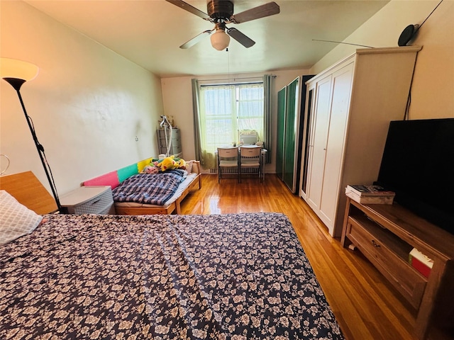 63-84 Saunders St Unit 2G, Rego Park, NY 11374 - bedroom featuring wood finished floors and ceiling fan