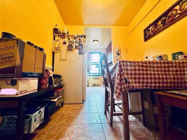63-84 Saunders St Unit 2G, Rego Park, NY 11374 - dining area featuring radiator heating unit