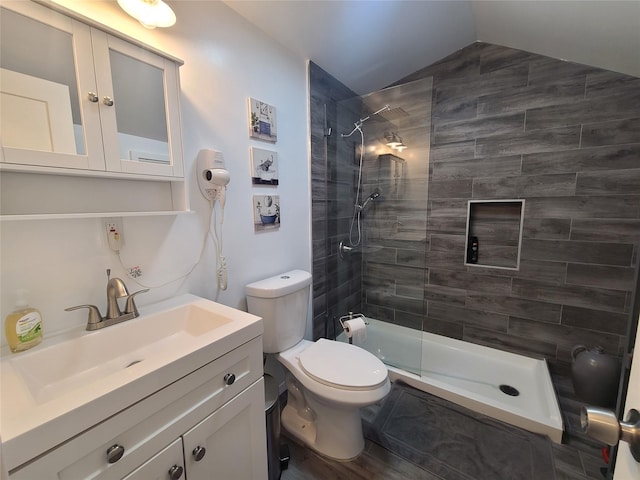 39 E James Ave, Smallwood, NY 12778 - bathroom featuring tiled shower, vanity, and vaulted ceiling