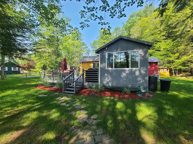 39 E James Ave, Smallwood, NY 12778 - view of front of home featuring a front yard and a deck