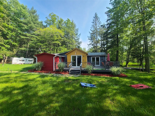 39 E James Ave, Smallwood, NY 12778 - rear view of property featuring a deck, a yard, and french doors