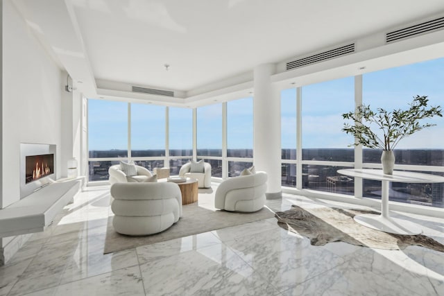 5 Renaissance Sq Unit Ph41G, White Plains, NY 10601 - sunroom / solarium with marble tiled flooring and floor to ceiling windows