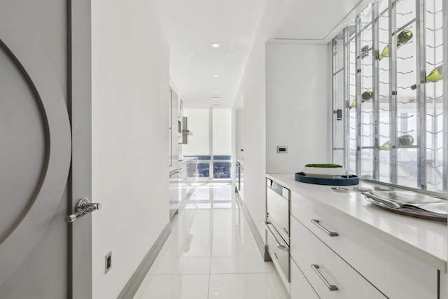 5 Renaissance Sq Unit Ph41G, White Plains, NY 10601 - hallway featuring plenty of natural light and light tile patterned flooring