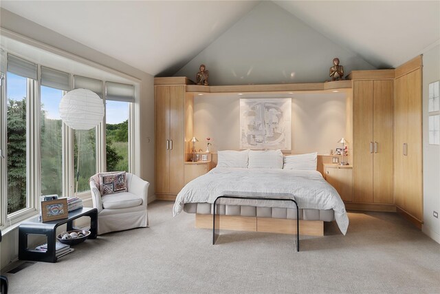 56 Tuthill Point Rd, East Moriches, NY 11940 - bedroom with vaulted ceiling and carpet floors