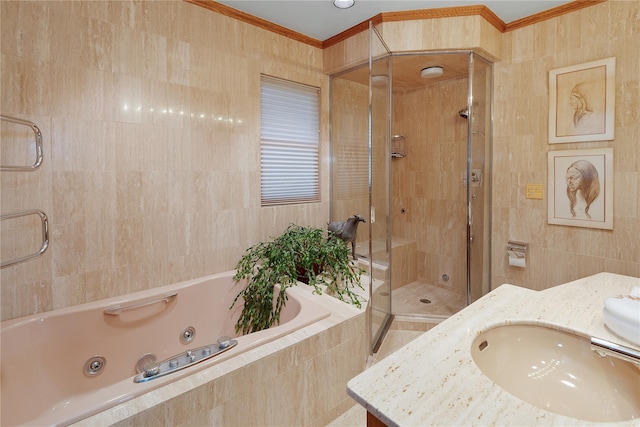 56 Tuthill Point Rd, East Moriches, NY 11940 - bathroom with a shower stall, tile walls, a tub with jets, vanity, and ornamental molding