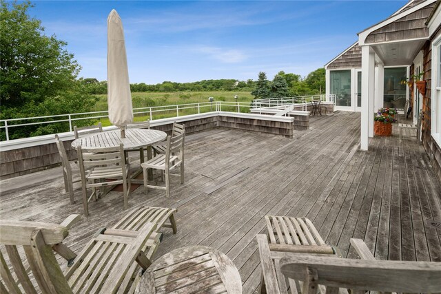 56 Tuthill Point Rd, East Moriches, NY 11940 - wooden terrace with outdoor dining space