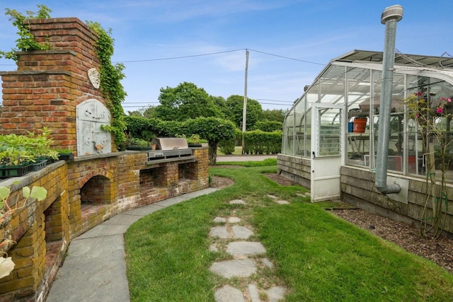 56 Tuthill Point Rd, East Moriches, NY 11940 - view of yard with an exterior structure and exterior kitchen