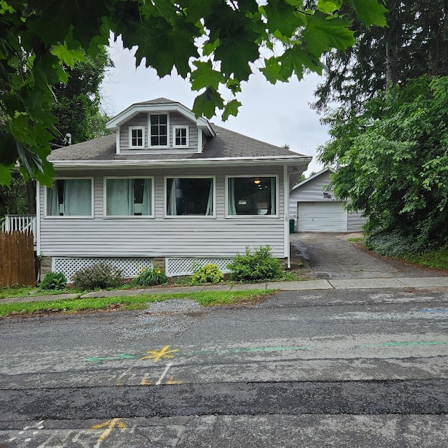 15 Wilmar Ter, Poughkeepsie, NY 12601 - bungalow-style home featuring an outdoor structure, a detached garage, and roof with shingles