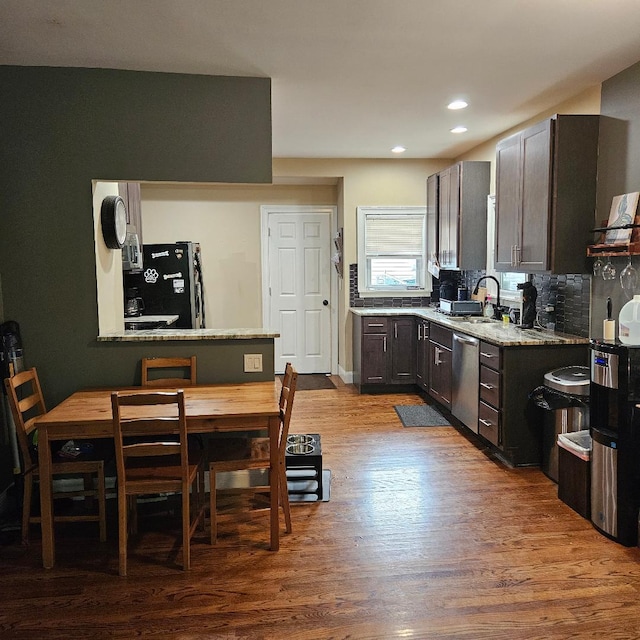 15 Wilmar Ter, Poughkeepsie, NY 12601 - kitchen with freestanding refrigerator, dishwasher, wood finished floors, decorative backsplash, and recessed lighting
