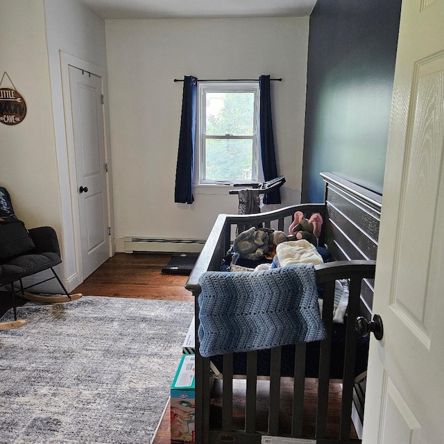 15 Wilmar Ter, Poughkeepsie, NY 12601 - bedroom featuring wood finished floors and baseboard heating