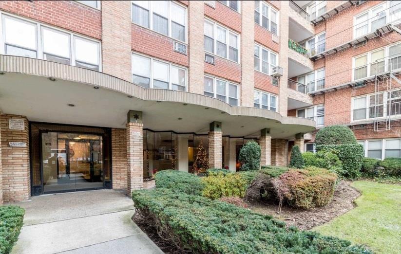 94-11 59th Ave Unit E21, Elmhurst, NY 11373 - view of apartment building / complex