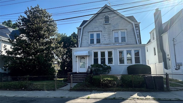 27-27 Ericsson St, East Elmhurst, NY 11369 - traditional-style home featuring a fenced front yard
