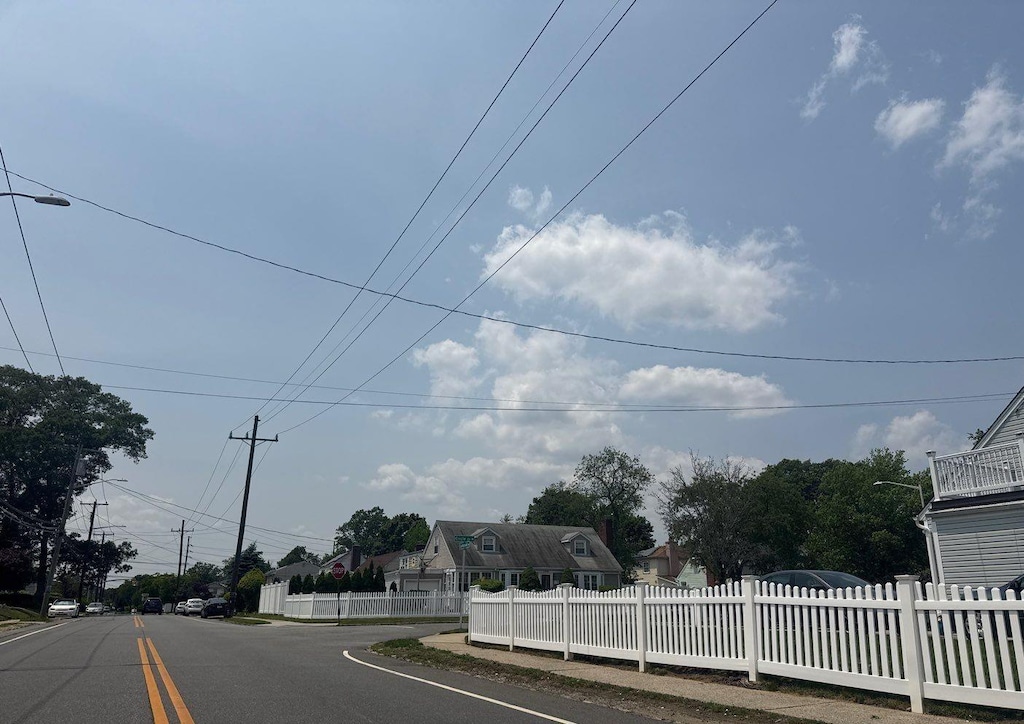 1009 Centennial Ave, North Baldwin, NY 11510 - view of asphalt road featuring street lights