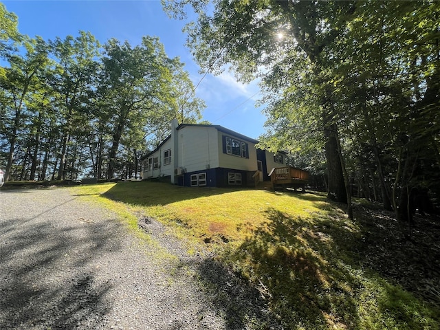 39 Hilltop Ln, Narrowsburg, NY 12764 - view of side of home with a lawn and gravel driveway